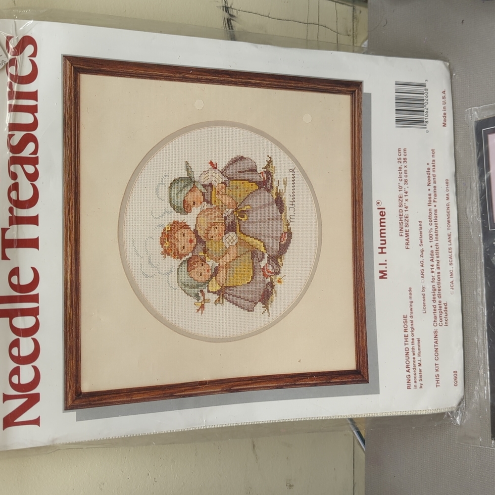 Counted Cross stitch embroidery of "ring around the Rosie."